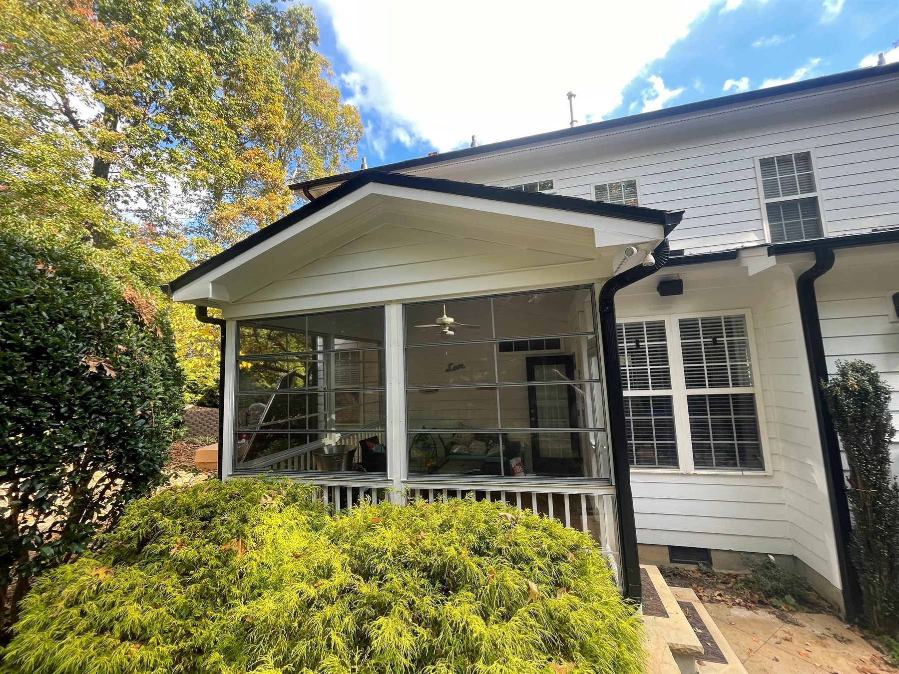 Completed Eze-Breeze porch enclosure by Best Screens.